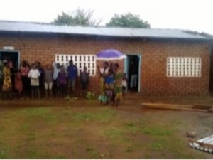 Staff and Children view the school conditions